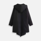 Cape poncho à capuche femme noire manches longues vue de dos sur fond blanc