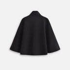 Cape poncho coton femme noir col montant vue de dos sur fond blanc