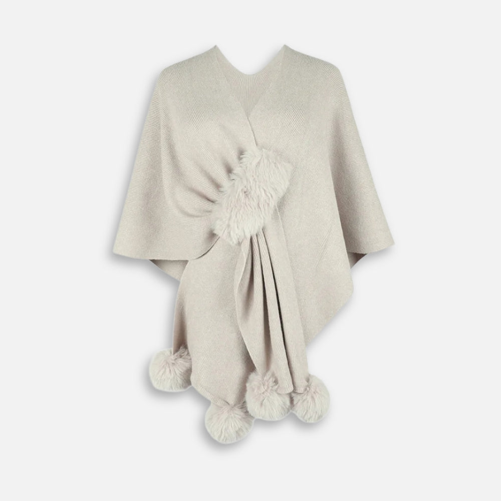 Cape poncho en coton beige clair avec pompons fausse fourrure, vue de face sans manches
