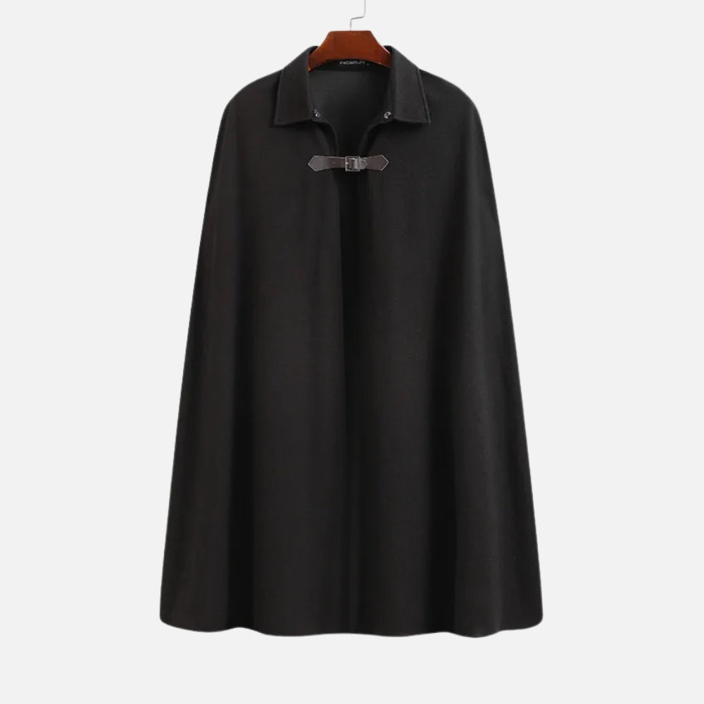 Cape poncho coton noir col chemise avec boucle cuir, vue de face sur cintre