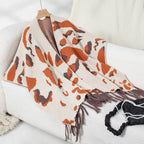 Cape poncho femme ouverte sans manches motif léopard orange marron franges