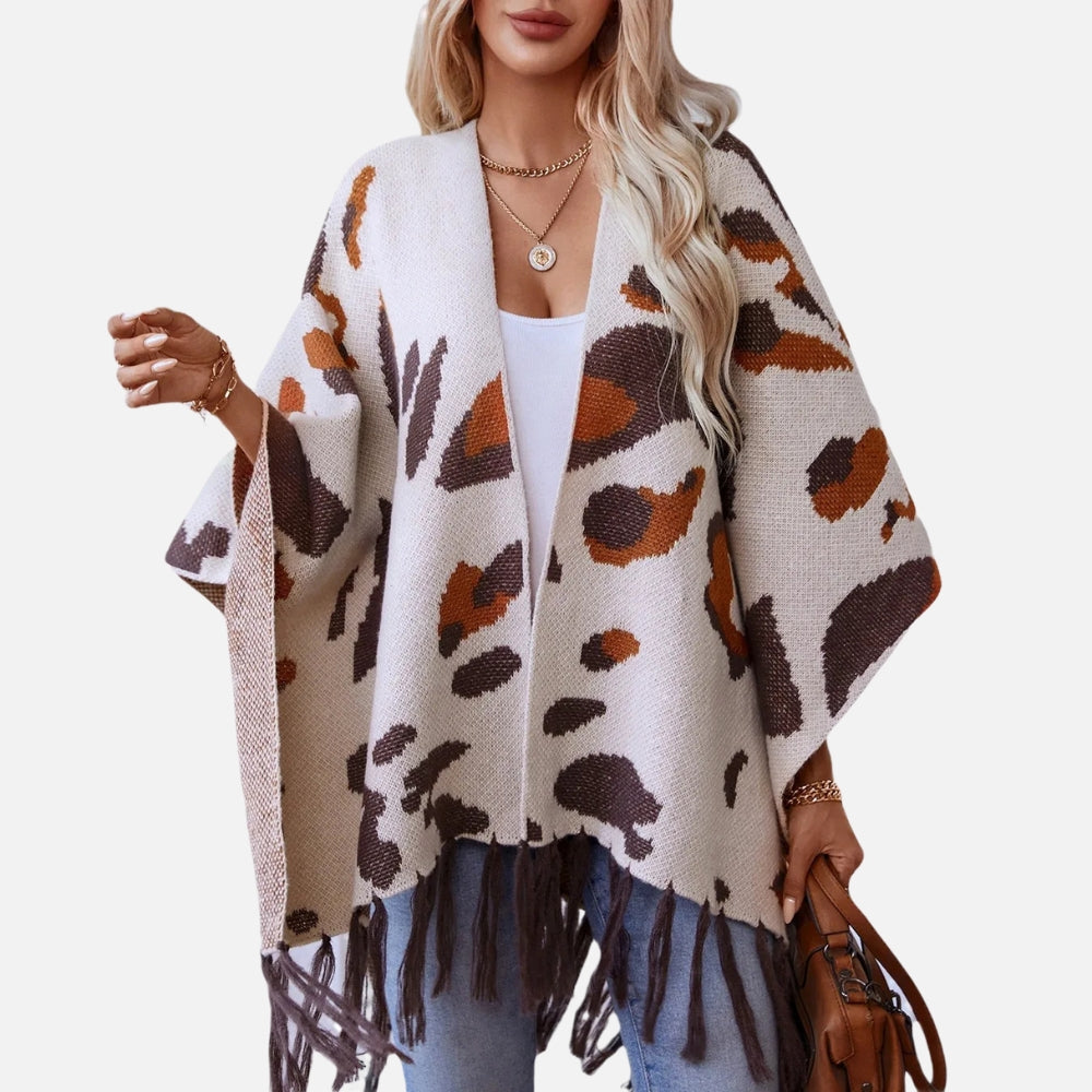 Cape poncho femme léopard marron blanc avec franges, portée ouverte sans manches