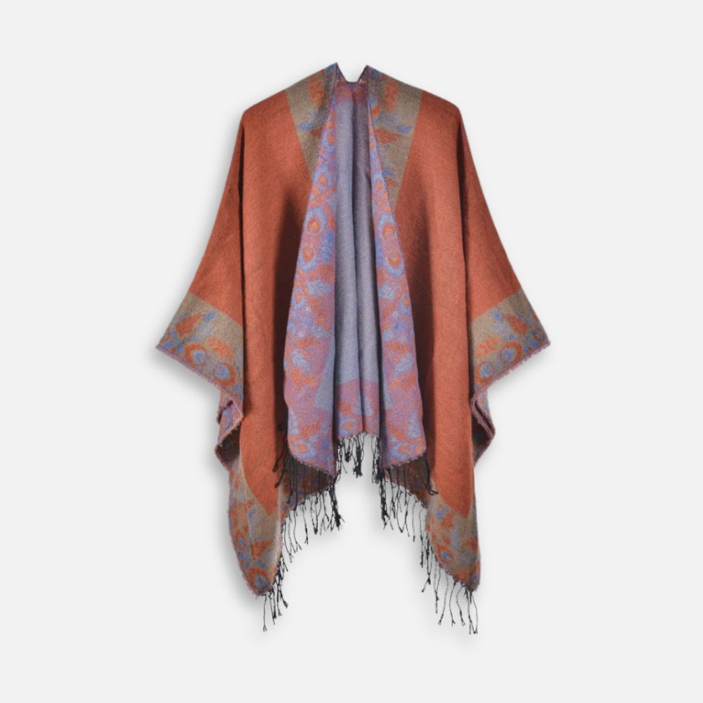 Cape poncho femme terracotta avec motifs floraux gris bleu et franges noires