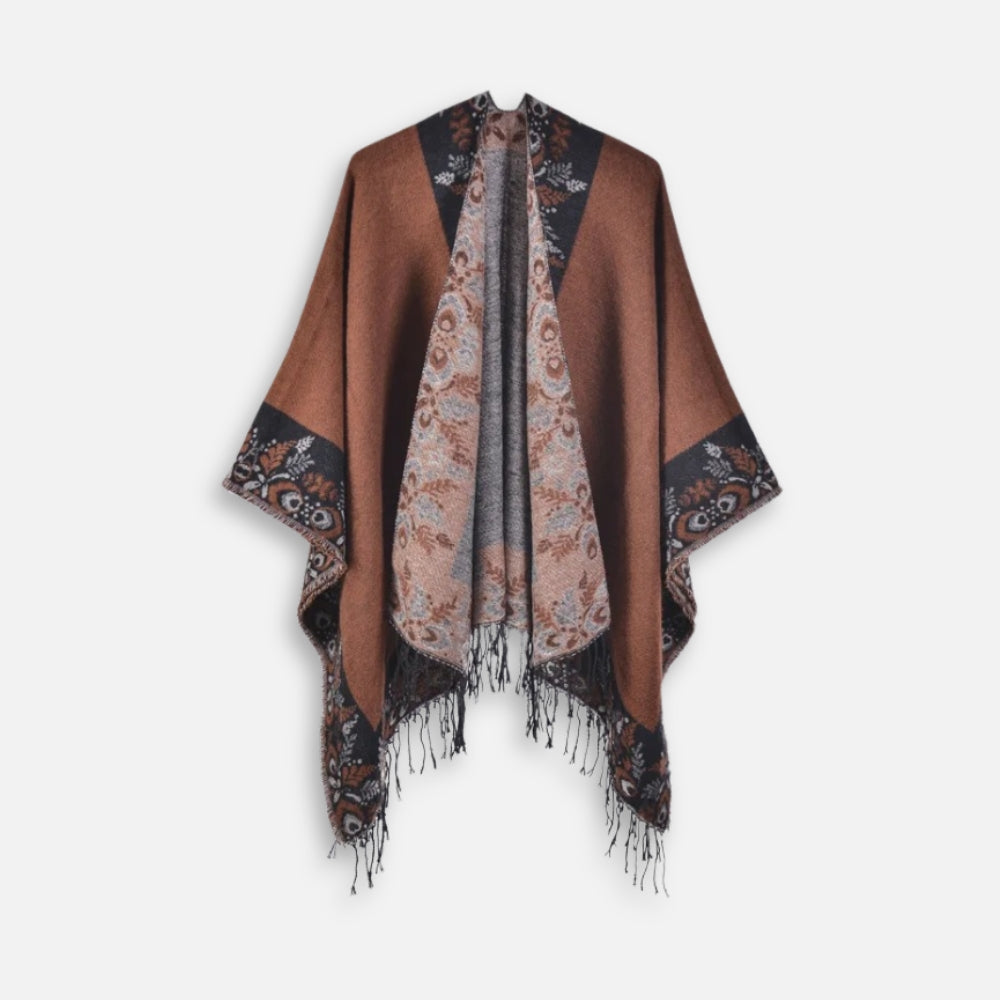 Cape poncho femme marron avec motifs floraux noirs et franges grises, vue de face