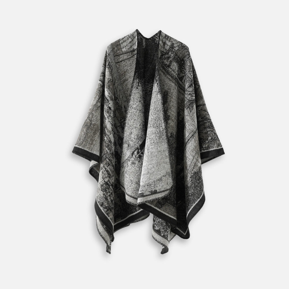 Cape poncho femme ouverte à motif vintage bohème gris et noir présentée à plat