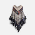 Cape poncho femme tricot motifs ethniques colorés franges noires col rond vue de face