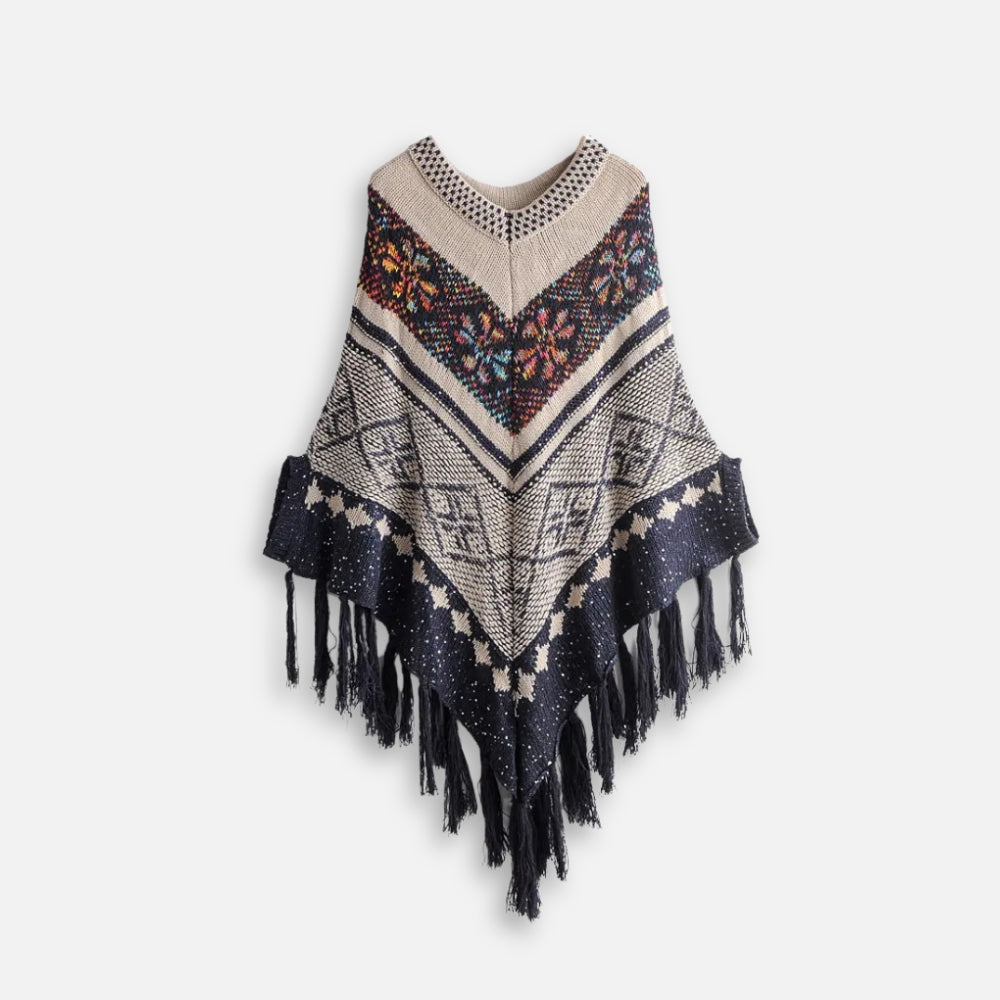 Cape poncho femme tricot motifs ethniques colorés franges noires col rond vue de face