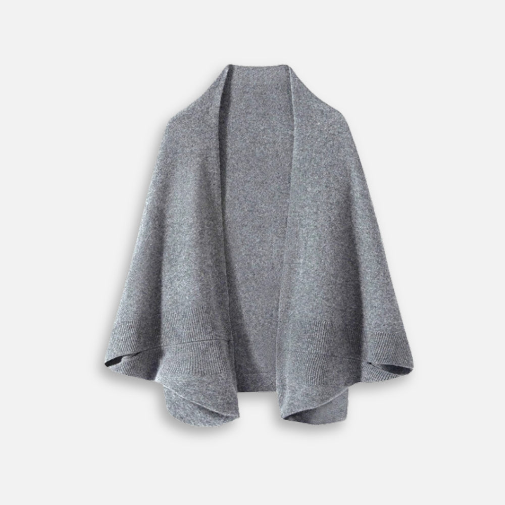 Cape poncho laine grise femme bords côtelés coupe fluide présentée à plat