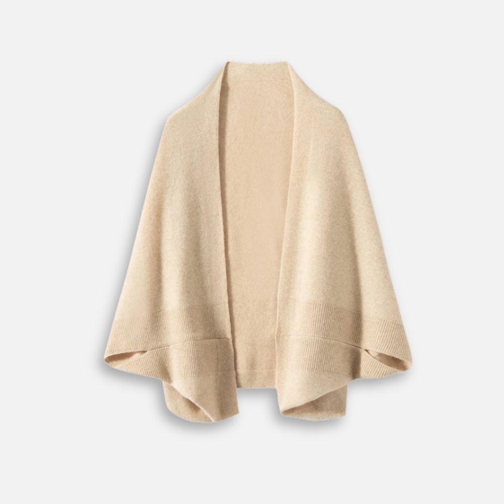Cape poncho laine femme beige clair bords côtelés coupe fluide présentée à plat