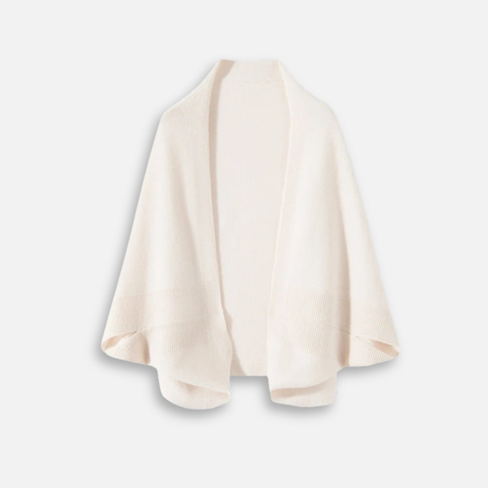 Cape poncho laine femme écru bords côtelés coupe fluide présentée de dos