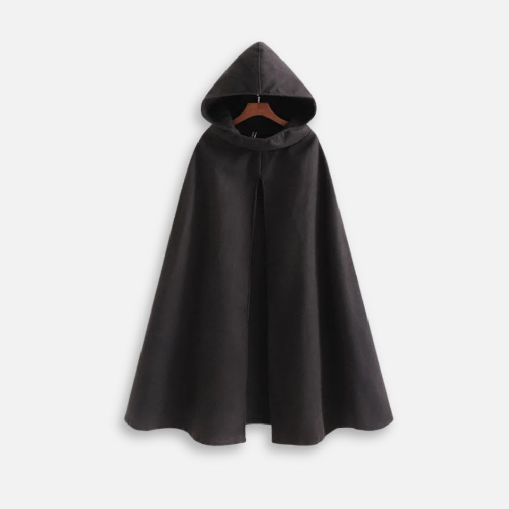 Cape poncho noire longue avec capuche intégrée sur cintre, vue de face, coupe ample