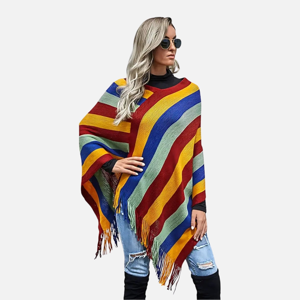 Femme portant cape poncho mexicain rayures colorées bleu rouge jaune vert franges