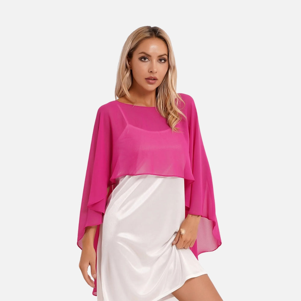 Cape poncho mousseline femme rose fuchsia manches larges portée avec jupe blanche