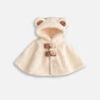 Cape poncho bébé blanc cassé avec capuche oreilles ours et boutons marron