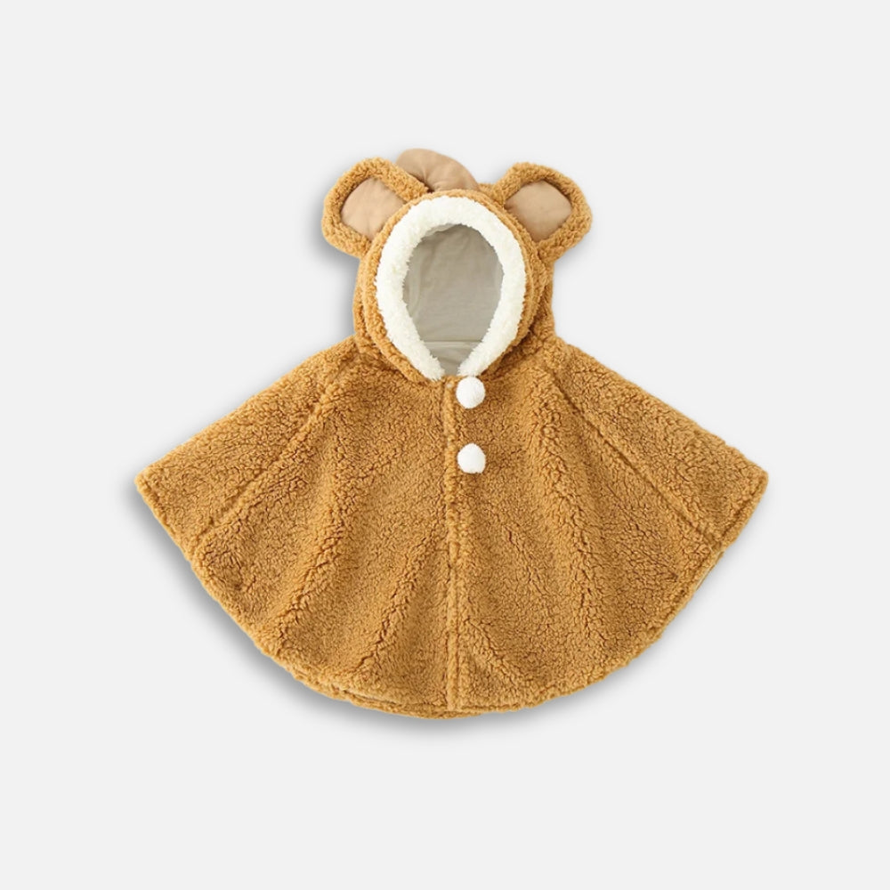 Cape poncho polaire bébé beige avec capuche oreilles et pompons blancs, vue de face