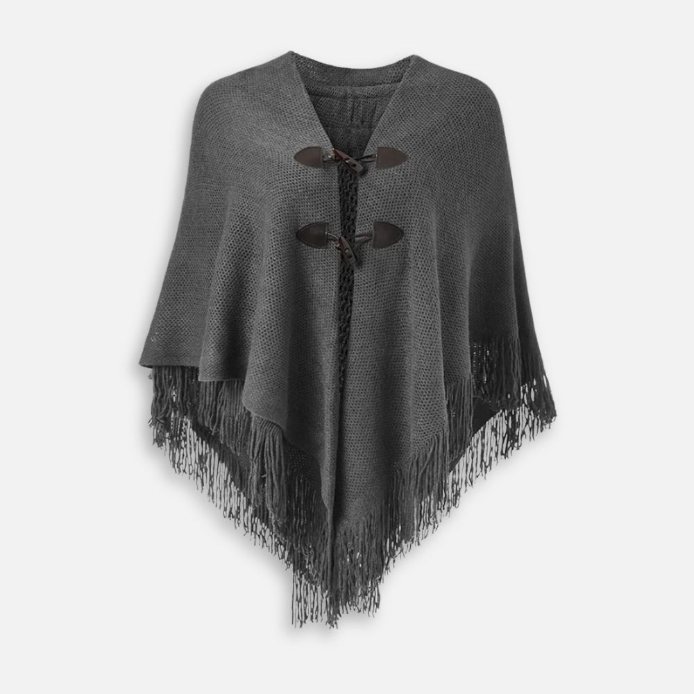 Cape poncho tricot gris femme avec franges, col châle et boutons noirs, vue de face