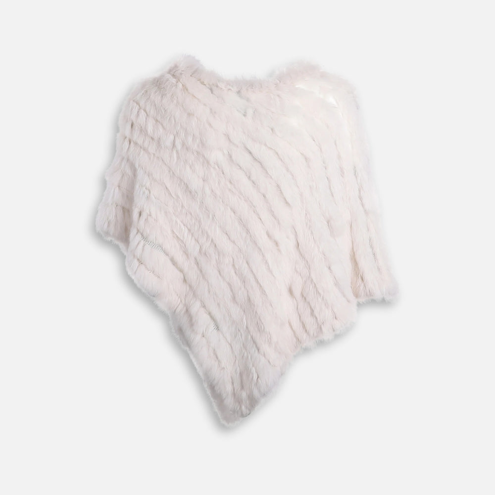 Poncho fourrure lapin blanc col rond avec pointes, présenté à plat sur fond neutre