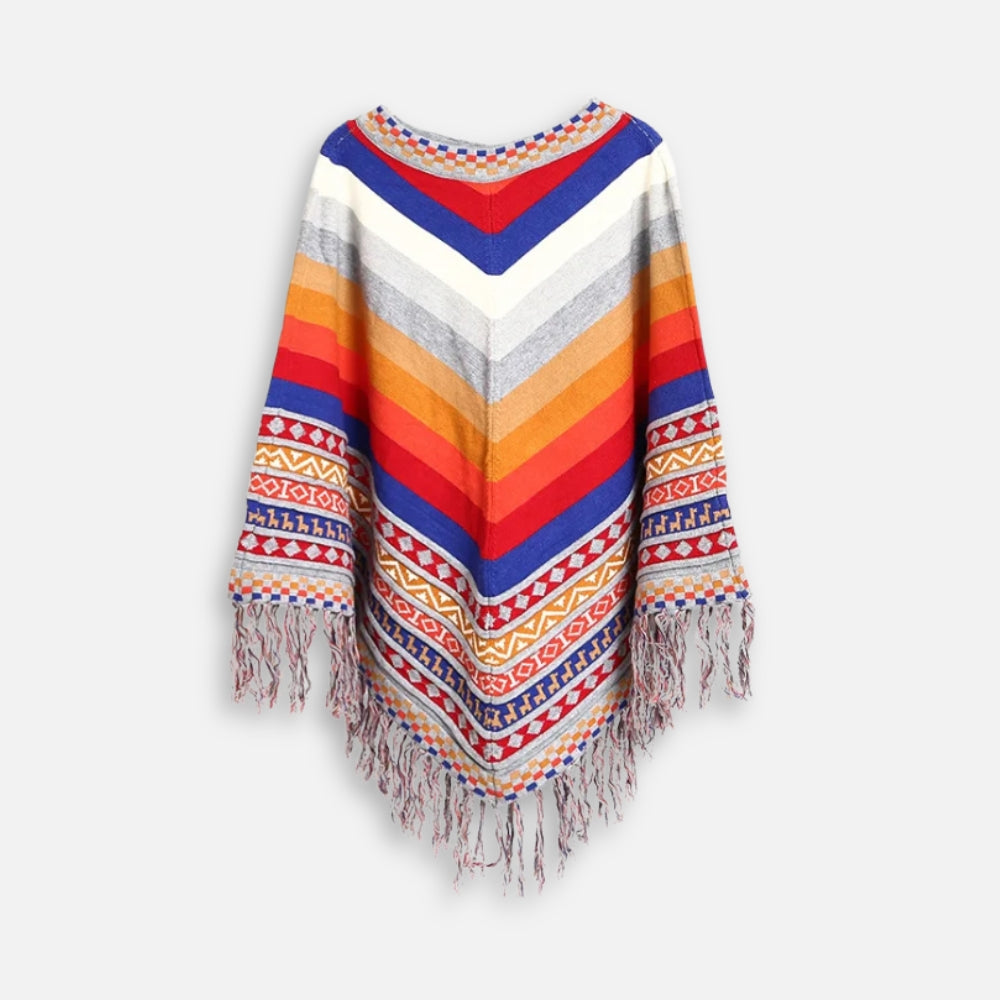 Poncho péruvien femme col V rayures multicolores avec franges grises, présenté à plat