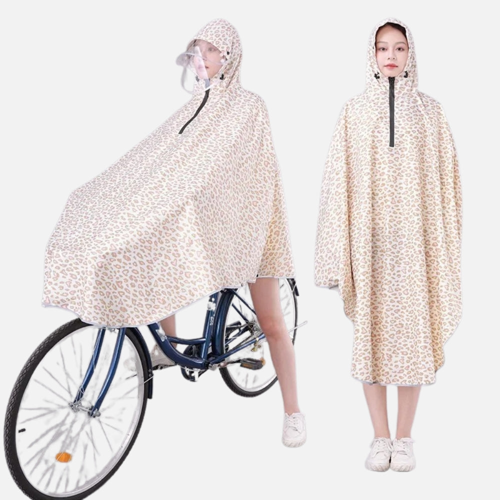 Poncho pluie femme léopard avec capuche visière, porté sur vélo et vue de face