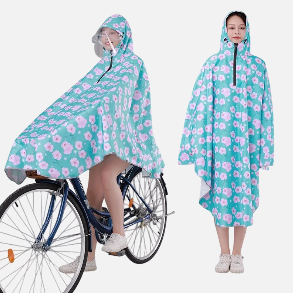 Poncho pluie vélo femme turquoise fleurs roses capuche visière, porté de face et de dos