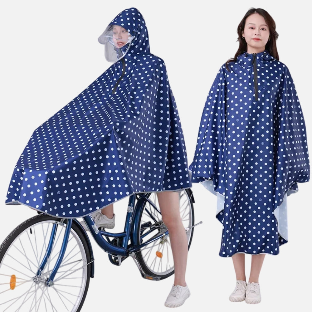 Poncho pluie vélo femme bleu marine à pois blancs avec capuche et visière, porté de face et dos