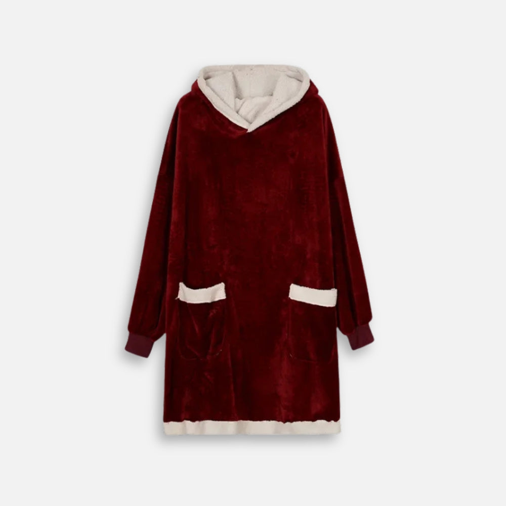 Poncho polaire sherpa rouge avec capuche beige, poches et ourlet contrastants, vue de face